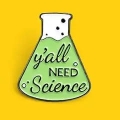 przypinka metalowa you all need science na żółtym tle