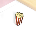 przypinka metalowa popcorn kino film dodatek