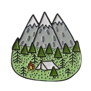 Metalowa przypinka turysty góry