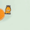 przypinka Garfield 104% tired kompozycja