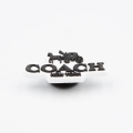 przypinka jibbitz Coach New York z mechanizmem montażowym