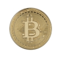 metalowa przypinka bitcoin złota z symbolem kryptowaluty
