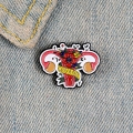 Pins metalowy feministyczny macica girl power na ubraniu