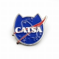 metalowa przypinka CATSA nasa dla kotów parodia