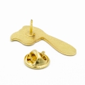 pins szczoteczka do zębów zapięcie metalowe złote tył