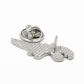 pins czarny dinozaur zapięcie metalowe tylna strona