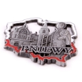 Magnes metalowy Pniewy - widok pod kątem z reliefowymi zabytkami